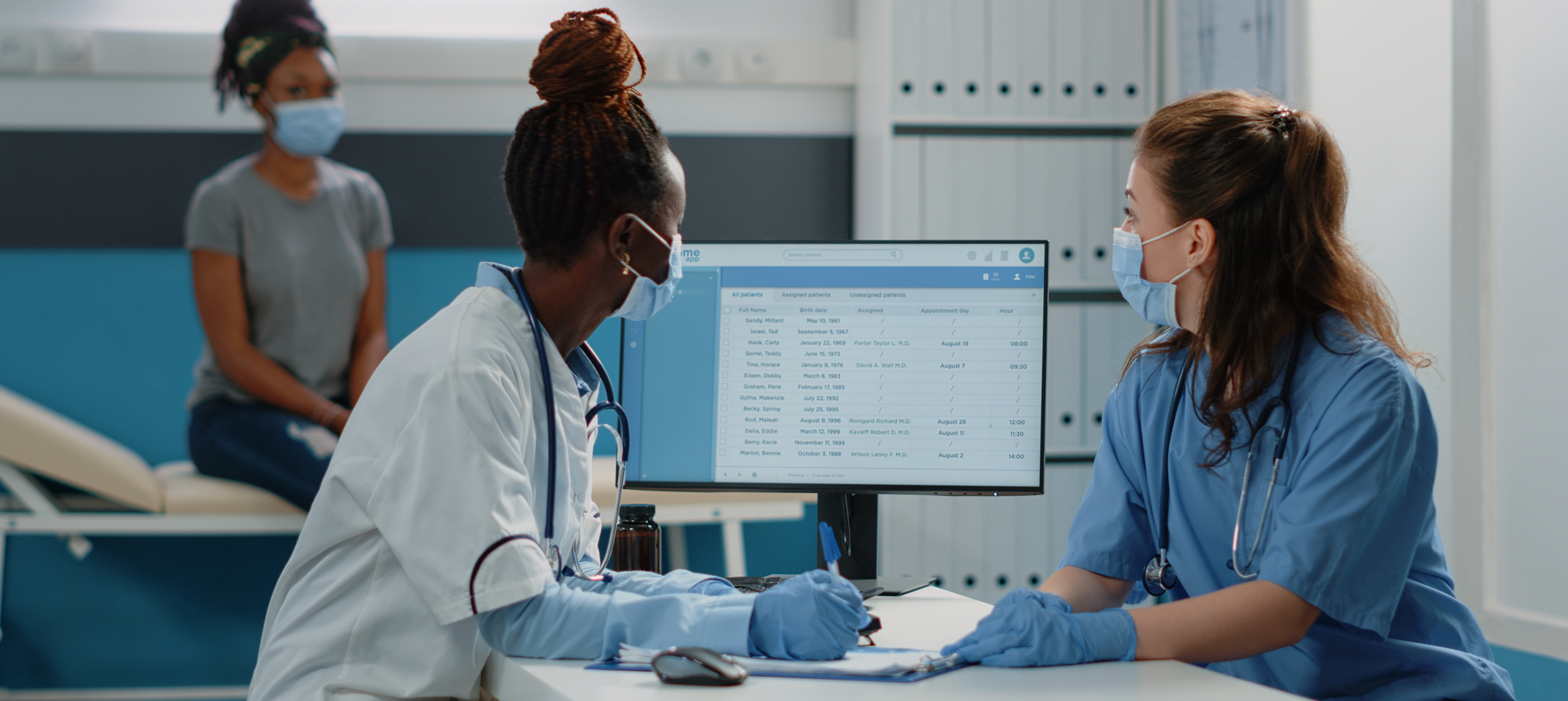Hospital care team reviewing patient information together